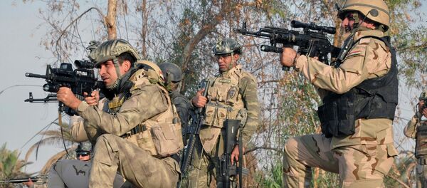 Militantes iraquíes Militantes iraquíes - Sputnik Mundo