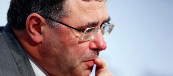 Patrick Pouyanne, who became CEO of Total last week, pauses before speaking at the Oil & Money conference in central London, October 30, 2014. - Sputnik Mundo