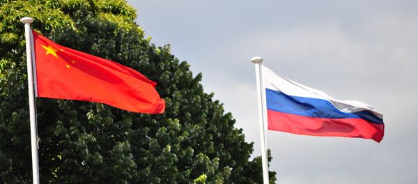 Banderas de Rusia y China - Sputnik Mundo