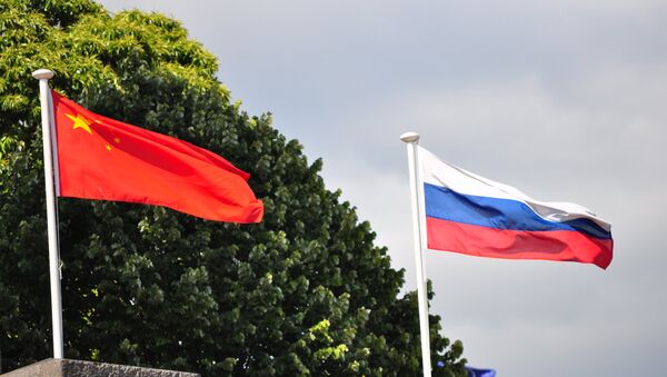 Banderas de Rusia y China - Sputnik Mundo