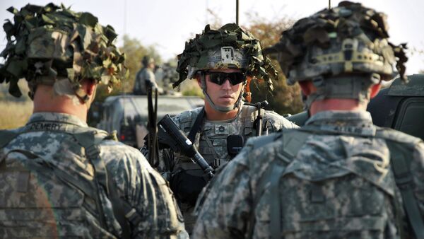 US soldiers conduct reconnaissance training at the 7th Army Joint Multinational Training Command's Grafenwoehr Training Area, Germany, Oct. 8, 2013 - Sputnik Mundo