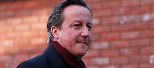 Britain's Prime Minister David Cameron arrives for his visit to the Harris City Academy in south London December 8, 2014. Britain's Prime Minister David Cameron arrives for his visit to the Harris City Academy in south London December 8, 2014. - Sputnik Mundo