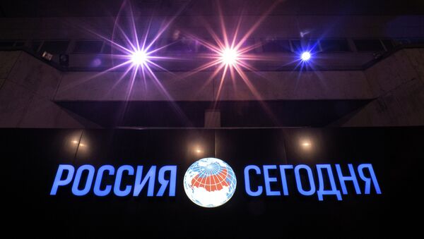 Logo de Rossiya Segodnya - Sputnik Mundo