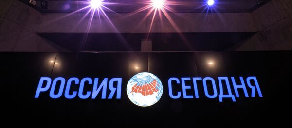 Logo de Rossiya Segodnya - Sputnik Mundo